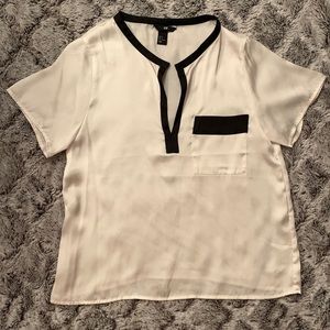 Off white/cream short sleeve blouse with black bordering